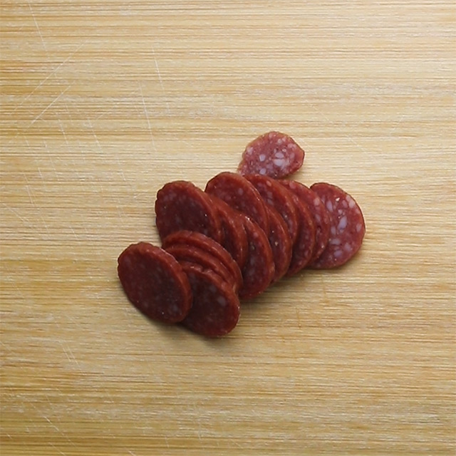 3. Slice dried sausage into rounds.