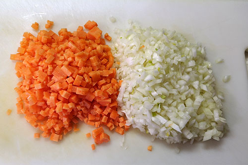 1. Finely chop the onions and carrots.